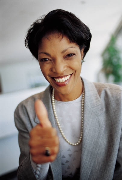 African American woman giving a thumbs up