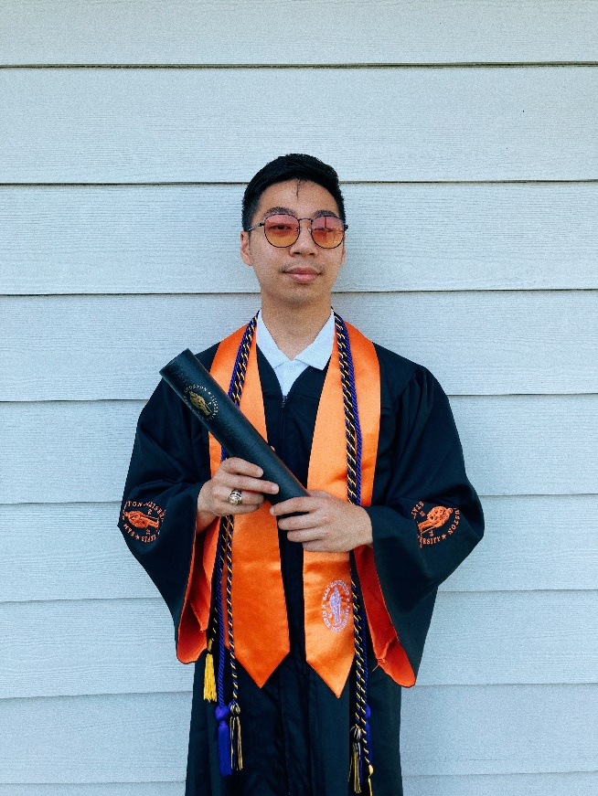 Daniel Do in graduation regalia