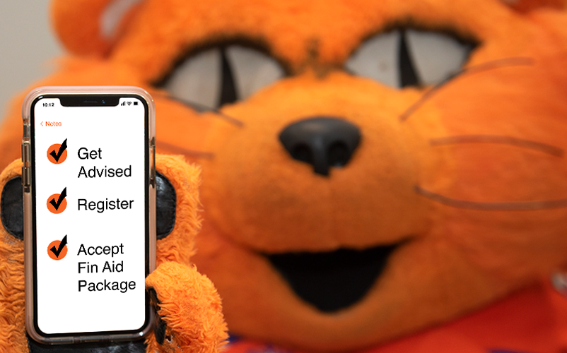Sammy holding phone with checklist - Get Advised, Register, Accept Fin Aid Package