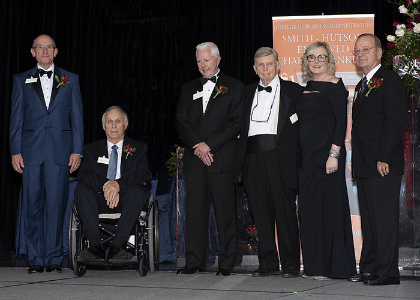 Recipients posing on stage