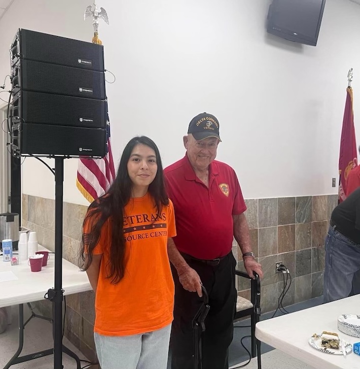 Yori Caldera, the youngest Marine in attendance at Huntsville's HEARTS Veterans Museum of Texas Marine Corps Birthday Luncheon this week, poses with Colonel (Ret.) John Airola, the oldest Marine in attendance. 