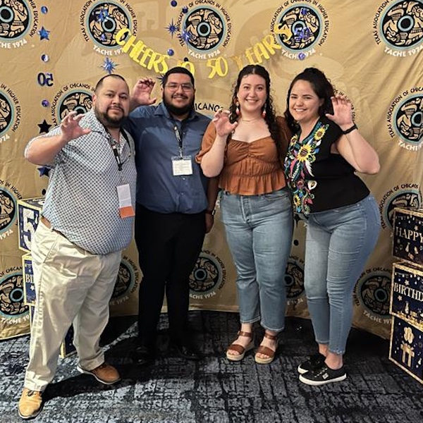 Marcus Gutierrez (leftmost) and Daniela Mirabal (rightmost) at the TACHE conference.