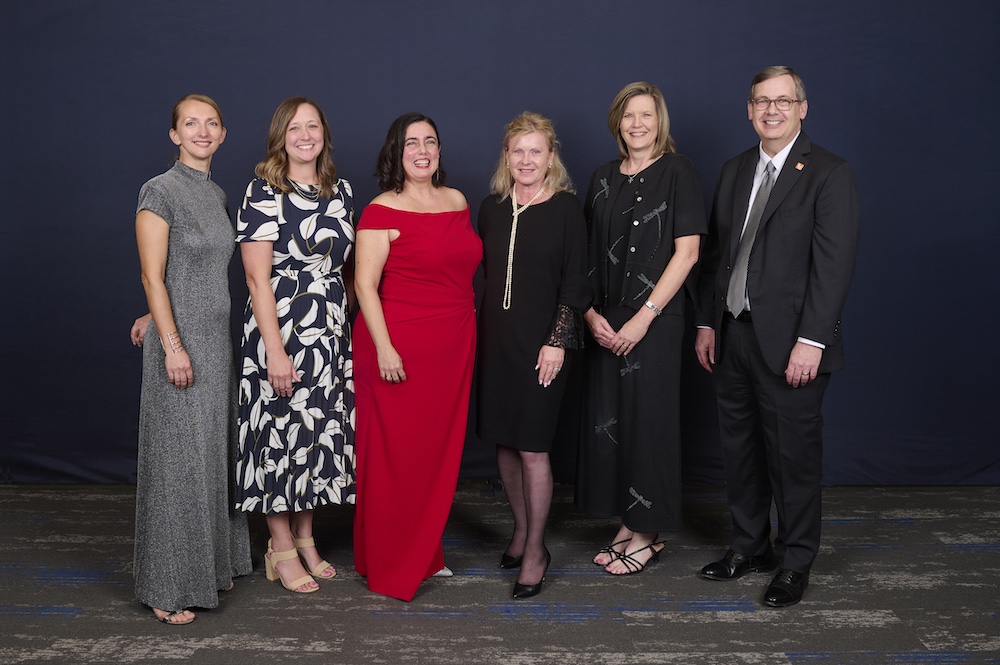 Olga Minich, Jaime Anderson, María Botero, Magdalena Denham, Tamara Cook and Provost Michael T. Stephenson