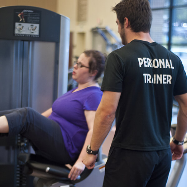 Students engage with a personal trainer..