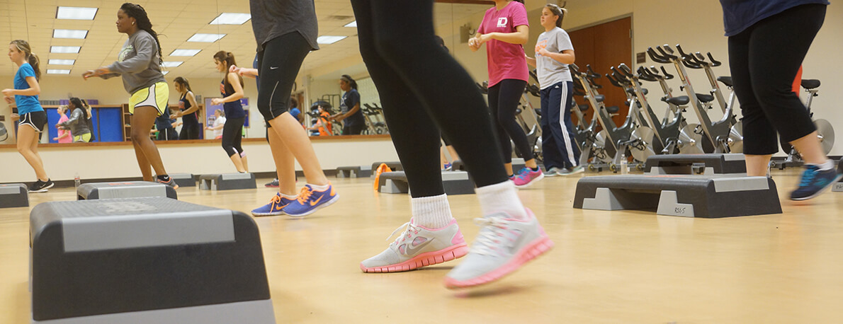 Students doing aerobics.